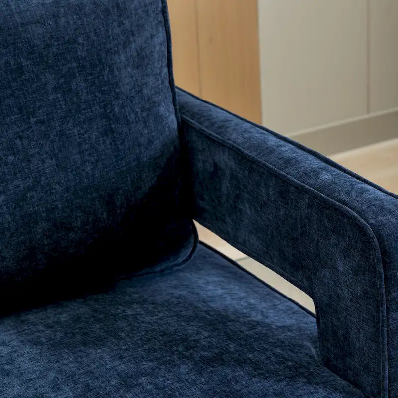 Fauteuil à dossier ouvert pivotant en tissu avec coussin